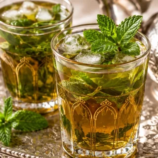 Moroccan Mint Tea: Sip on Sunshine! Discover the best Moroccan Mint Tea recipe! Easy to make, incredibly refreshing with honey, lemon, and fresh mint. Perfect f