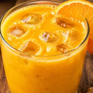 Orange Turmeric Crush: Sunshine in a Glass! Discover the Orange Turmeric Crush! A vibrant and delicious blend of orange juice, turmeric, and mango. Easy to make