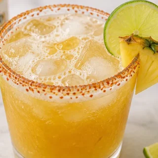 Pineapple Lime Chelada Recipe - pineapple chelada - Discover the best Pineapple Chelada recipe! Easy to make with fresh pineapple, limeade, Mexican beer, and op