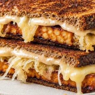 Tempeh Reuben: Healthier & Tastier! Discover the ultimate Tempeh Reuben sandwich! Healthier, packed with flavor, and incredibly delicious. Quick to make with a