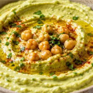 Creamy Avocado Hummus: Your New Obsession! Avocado hummus: master this creamy, vibrant dip in minutes. Perfect for a healthy snack or appetizer, packed with fla