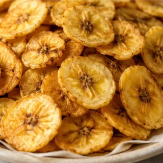 Crispy Baked Banana Chips: Your New Favorite Snack! Banana chips: master this simple baked recipe for perfectly crispy, sweet, and healthy banana chips at home.