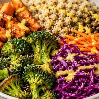 Vibrant Spring Broccoli Buddha Bowl Recipe - Buddha Bowl: Try this vibrant spring recipe packed with roasted veggies, hearty grains, and zesty lemon. A perfect