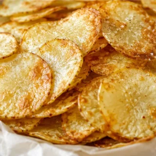 Crispy Homemade Baked Potato Chips! Baked potato chips: master this easy, crispy homemade snack in under an hour. Healthier than fried, perfect for guilt-free m