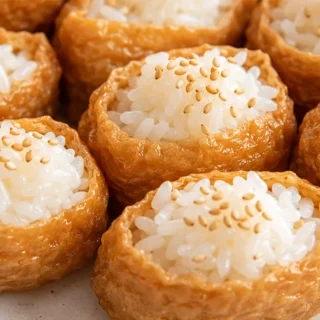 Quick Inari Sushi Bites - Inari sushi: master this simple 3-ingredient recipe for sweet and savory tofu pouches. Perfect for a quick, delicious snack or light m