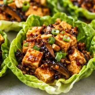 Spicy Mapo Tofu Lettuce Wraps - Mapo tofu: craft these spicy vegetarian lettuce wraps in under 30 minutes. A flavorful, satisfying meal perfect for a quick week