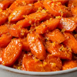 Dazzling Orange Glazed Carrots: Your New Favorite Side! Orange glazed carrots: whip up these tender, sweet, and vibrant carrots with fresh ginger and orange zes