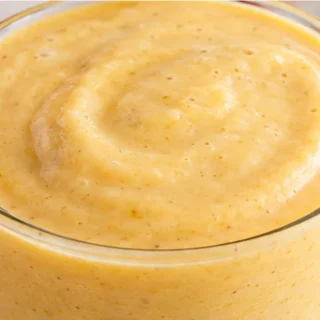 Sip Summer! Creamy Peach Mango Smoothie! Peach mango smoothie: blend this refreshing vegan drink in minutes. A healthy, thick, and tropical treat perfect for an