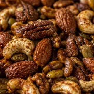 Crispy Pumpkin Spice Nuts: Your Fall Snack Obsession! Pumpkin Spice Nuts: Roast this irresistible mix of nuts and seeds with maple syrup for a perfect fall snac