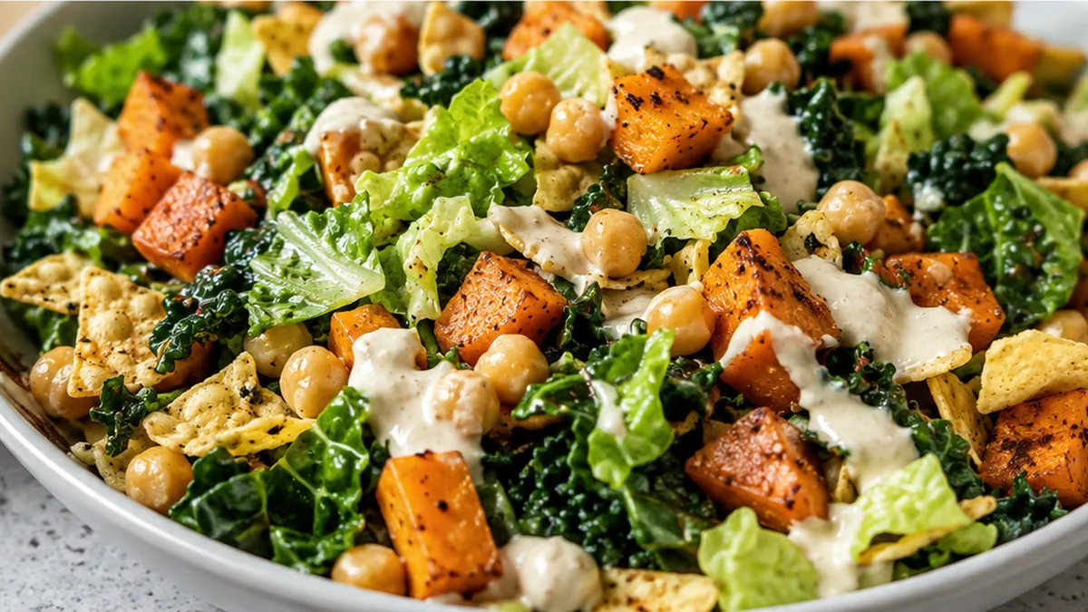 Sweet Potato Chickpea Taco Salad - Taco salad: enjoy this bright vegan sweet potato and chickpea recipe. Loaded with flavor, it's perfect for a healthy and sati
