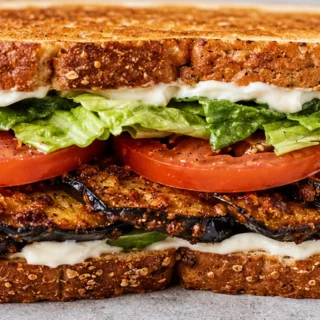 Crispy Eggplant BLT: The Vegan Sandwich! - vegan BLTA - Vegan BLTA: craft this satisfying sandwich with smoky, crispy eggplant 'bacon'. A plant-based take on a