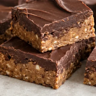 Vegan Chocolate Peanut Butter Fudge Bars - vegan fudge bars - Vegan fudge bars: craft these rich, no-bake chocolate peanut butter treats. A delightful dessert t