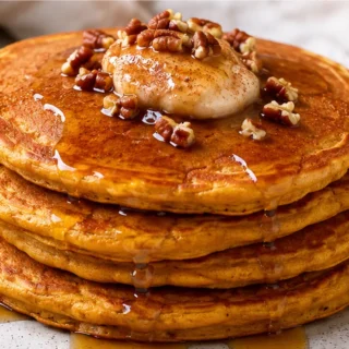 Fluffy Vegan Pumpkin Pancakes: Fall Dream! Vegan Pumpkin Pancakes: make these delightful, fluffy pancakes perfect for a cozy fall breakfast. Simple ingredients,