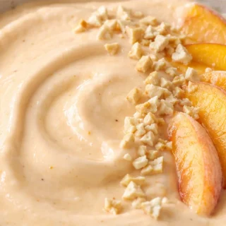 5-Minute Vegan Peach Yogurt Bliss - vegan yogurt - Vegan yogurt: make this creamy, dreamy peach-flavored plant-based delight in just 5 minutes. Perfect for a qu