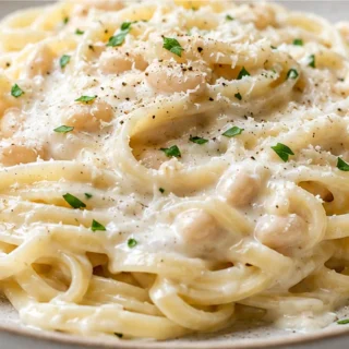 Creamy White Bean Alfredo Pasta - White Bean Alfredo: whip up this healthy and creamy plant-based pasta sauce in under 15 minutes. Dairy-free and delicious, per