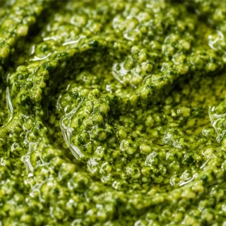 Zesty Arugula Pesto: Fresh & Fast! Arugula pesto: craft this fresh and peppery sauce in minutes. Perfect for pasta, sandwiches, or as a healthy dip.