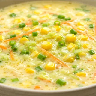 Creamy Sweet Corn Soup - Sweet Corn Soup: cook this comforting and creamy soup in your Instant Pot. Quick, flavorful, and loaded with fresh vegetables for a who