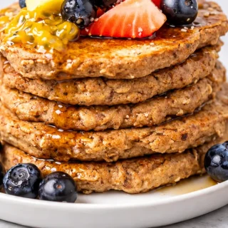 Fluffy Vegan Pancakes - Whip up fluffy vegan pancakes using whole wheat flour and oats! This easy recipe is perfect for a healthy and delicious breakfast or bru